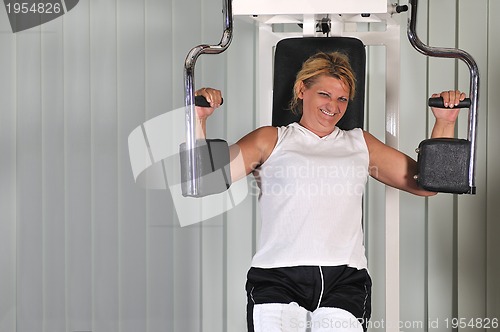 Image of Mature  woman work out in fitness