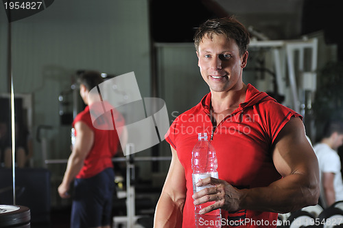 Image of Strong  man work out in gym