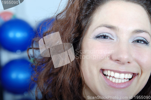 Image of happy girl in fitness studio