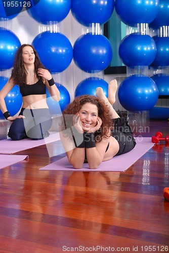 Image of happy girl in fitness studio