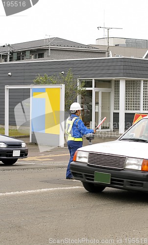 Image of Man directing traffic