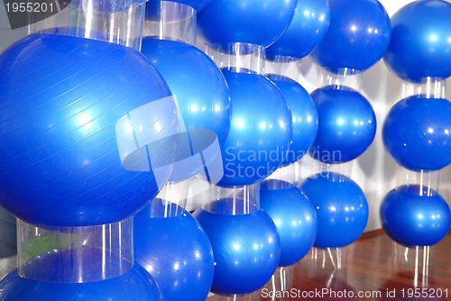 Image of fitness studio with blue pilates balls