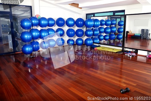 Image of fitness studio with blue pilates balls