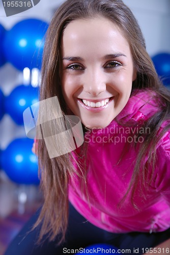 Image of happy girl in fitness studio