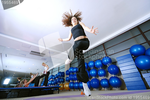 Image of Dancing woman, happy and jumping up.