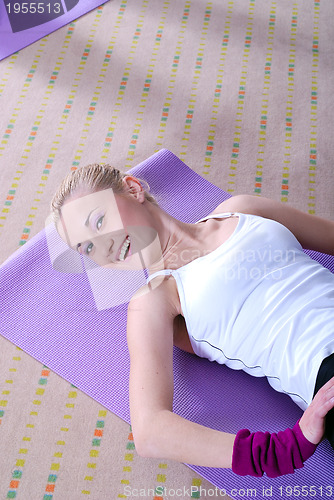 Image of woman exercise in a fitness center