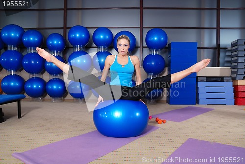 Image of health club: women doing stretching and aerobics