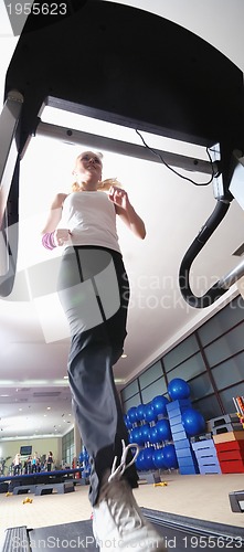 Image of inifinity health and condition concept with running woman