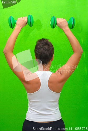 Image of fitness training with dumbbell 