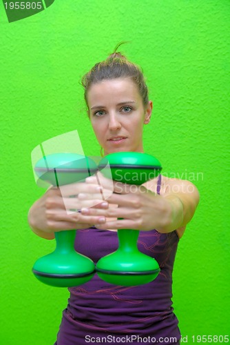 Image of fitness training with dumbbell 