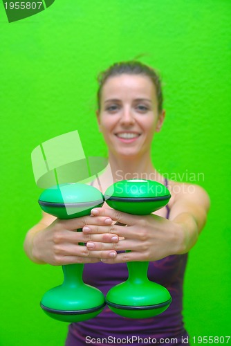 Image of fitness training with dumbbell 