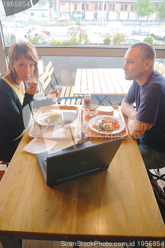 Image of happy couple at lunch 