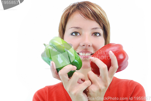 Image of pretty girl with pepper isolated