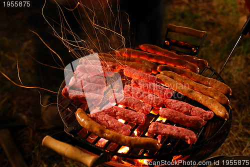 Image of sausages on grill