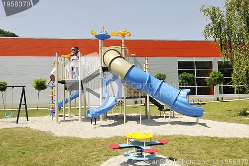 Image of family portrait at park playground