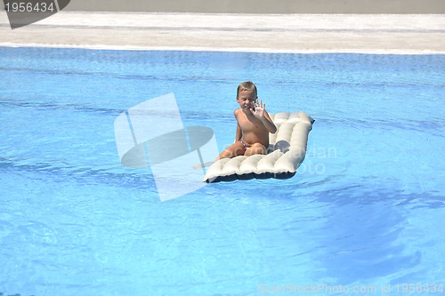 Image of children on swimming pool