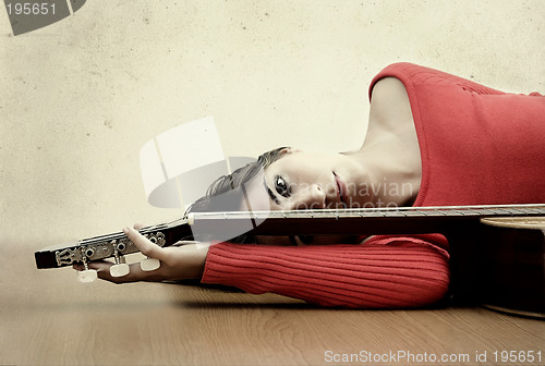 Image of Girl with a guitar