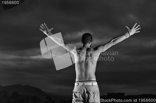 Image of Man with his arms wide open