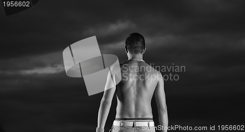 Image of young man portrait in night