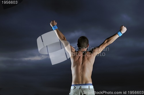 Image of Man with his arms wide open