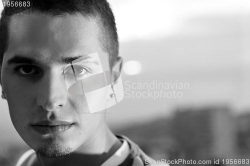 Image of urban style boy looking in camera