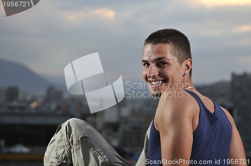 Image of urban style boy looking in camera