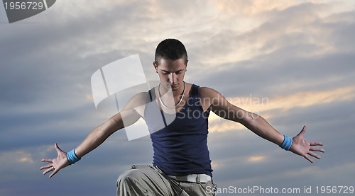 Image of Man with his arms wide open