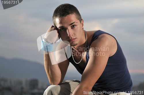 Image of urban style boy looking in camera