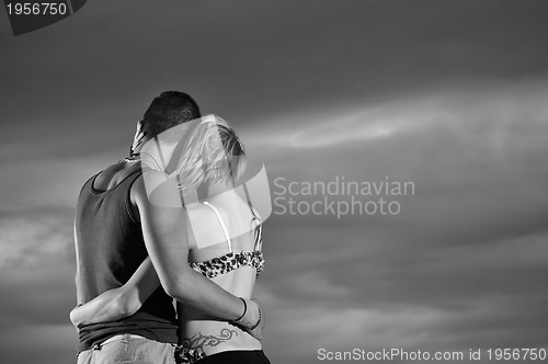 Image of romantic urban couple dancing outdoor