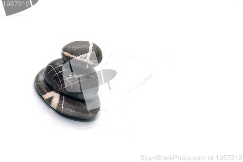 Image of .zen stones with reflection isolated