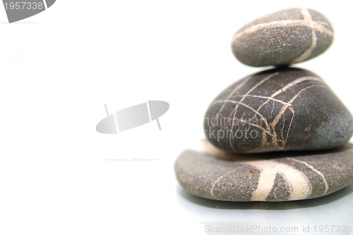 Image of .zen stones with reflection isolated