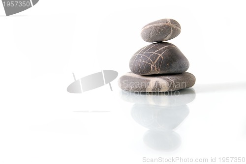 Image of .zen stones with reflection isolated