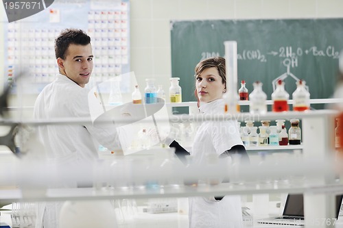 Image of students couple in lab