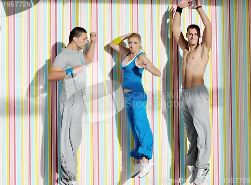 Image of young adults group in fitness club