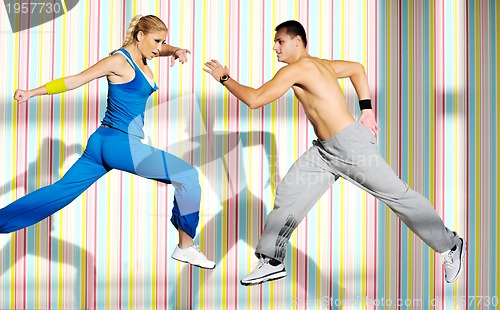 Image of young adults group in fitness club