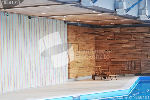 Image of wooden pool furniture