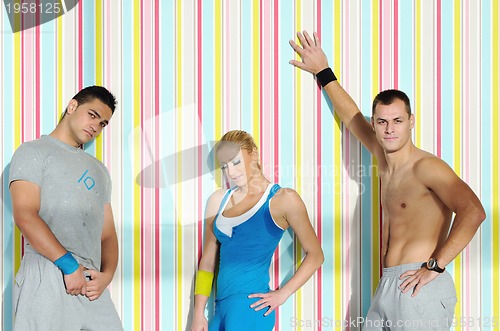 Image of young adults group in fitness club