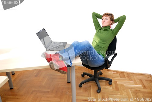 Image of casual girl relaxing at the office