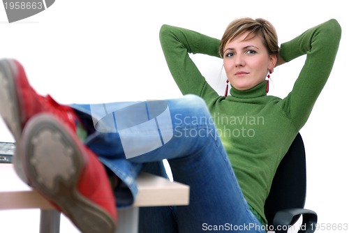 Image of casual girl relaxing at the office