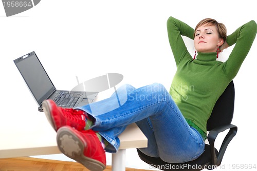 Image of casual girl relaxing at the office