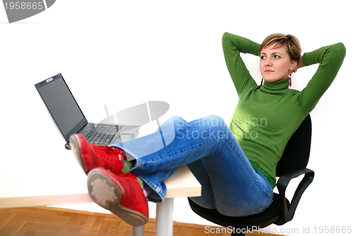 Image of casual girl relaxing at the office