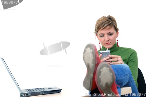 Image of casual girl relaxing at the office