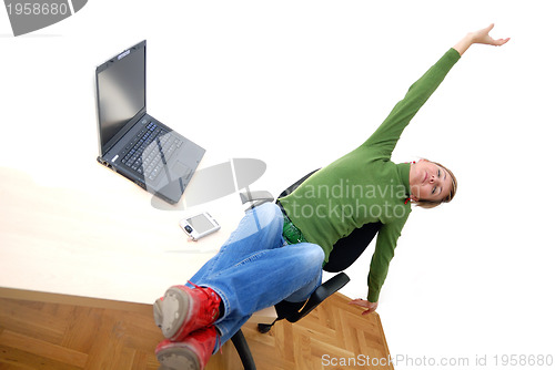 Image of casual girl relaxing at the office