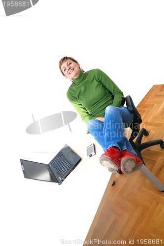 Image of casual girl relaxing at the office