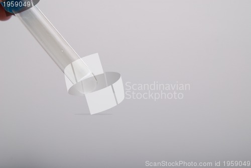 Image of test-tube in woman hand