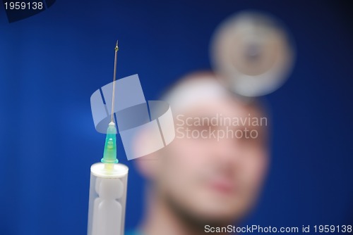 Image of doctor with injection