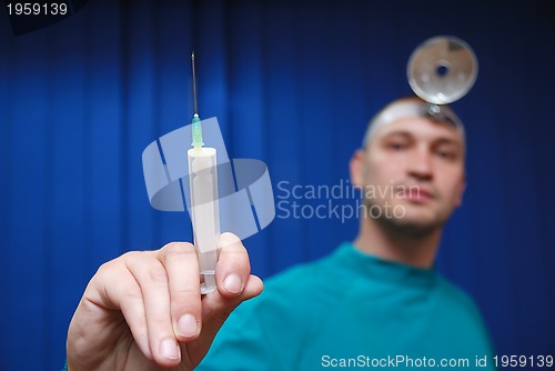 Image of doctor with injection