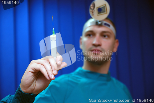 Image of doctor with injection