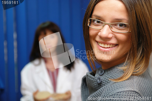 Image of happy patient and doctor