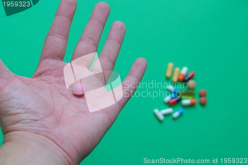 Image of pills in hand